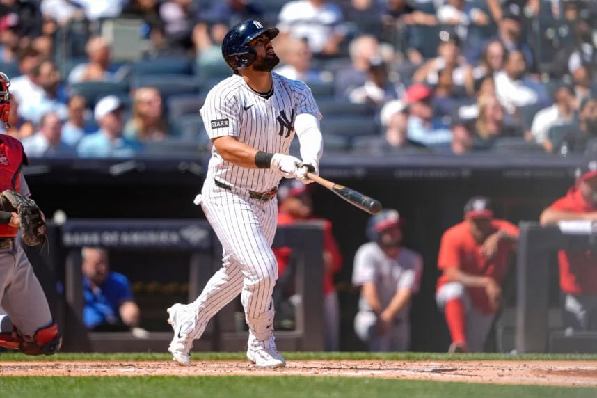 Aug 27, 2025; Bronx, New York, USA; New York Yankees left fielder Jasson Dominguez (24) hits a double against the Washington Nationals during the third inning at Yankee Stadium. Mandatory Credit: Gregory Fisher-Imagn Images