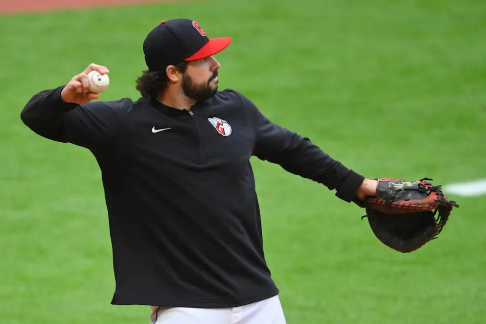 May 6, 2024; Cleveland, Ohio, USA; Cleveland Guardians catcher Austin Hedges (27) warms up the pitcher in the fifth inning against the Detroit Tigers at Progressive Field. Mandatory Credit: David Richard-Imagn Images