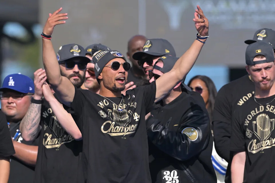 Nov 3, 2025; Los Angeles, CA, USA; Los Angeles Dodgers shortstop Mookie Betts (50) leads the crowd during the World Series celebration at Dodger Stadium. Mandatory Credit: Jayne Kamin-Oncea-Imagn Images