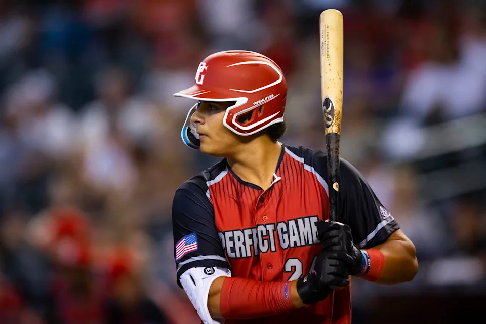 Aug 28, 2022; Phoenix, Arizona, US; West infielder/catcher Ralphy Velazquez (24) during the Perfect Game All-American Classic high school baseball game at Chase Field. Mandatory Credit: Mark J. Rebilas-Imagn Images