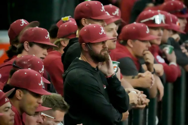Alabama head coach Rob Vaughn watches the game progress from the dugout as the Tide played UAB at Sewell-Thomas Stadium Tuesday, April 15, 2025.