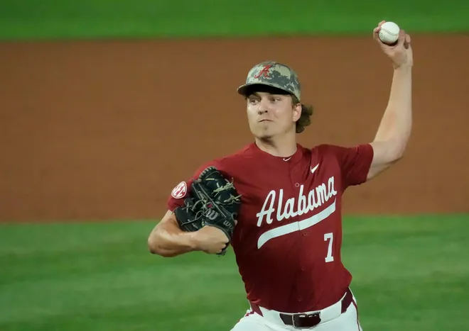 Apr 24, 2025; Tuscaloosa, AL, USA; Alabama pitcher Matthew Heiberger (7) pitches in relief Thursday against Missouri at Sewell-Thomas Stadium.