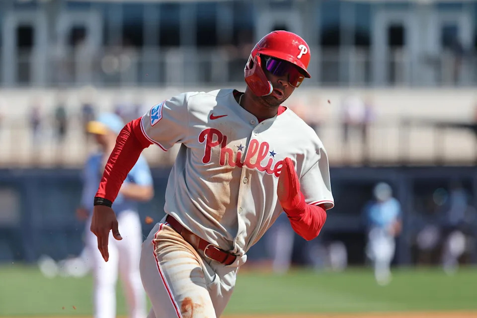 Feb 25, 2025; Port Charlotte, Florida, USA; Philadelphia Phillies outfielder Justin Crawford (80) runs home to score against the Tampa Bay Rays during the fourth inning at Charlotte Sports Park. Mandatory Credit: Kim Klement Neitzel-Imagn Images