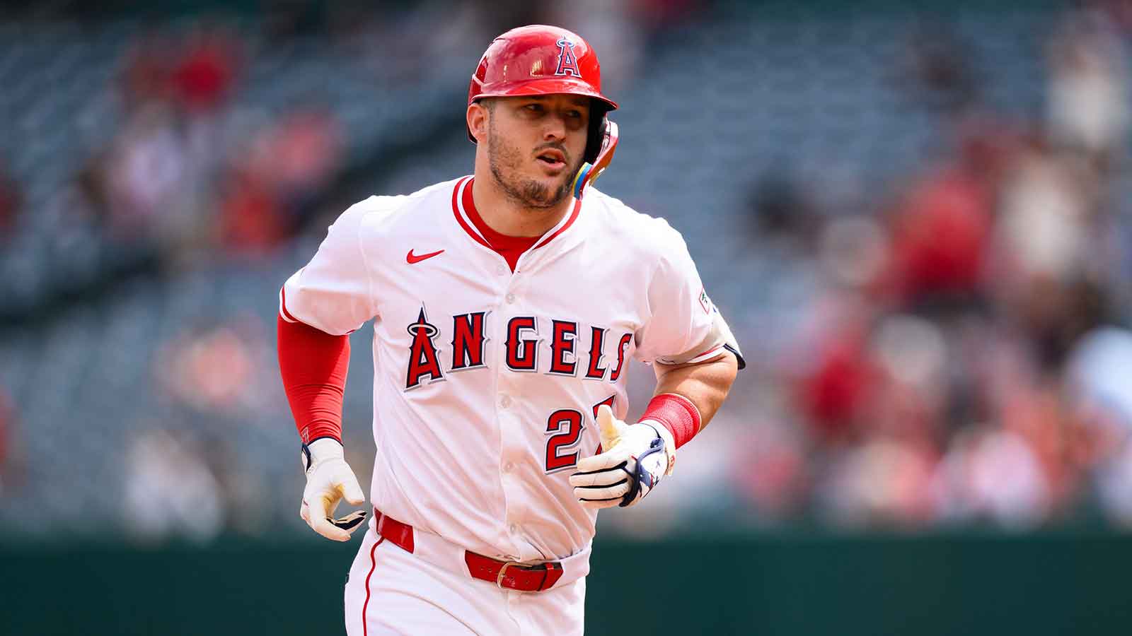 Los Angeles Angels designated hitter Mike Trout (27) runs after hitting a home run during the first inning against the Houston Astros at Angel Stadium.