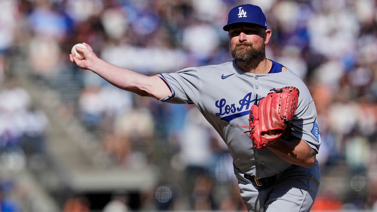 Los Angeles Dodgers pitcher Kirby Yates throws to a San Francisco Giants batter during the ninth inning of a baseball game Sunday, Sept. 14, 2025, in San Francisco. (AP Photo/Godofredo A. Vásquez,File)