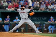 Cleveland Guardians relief pitcher Jakob Junis works against the Texas Rangers during a...