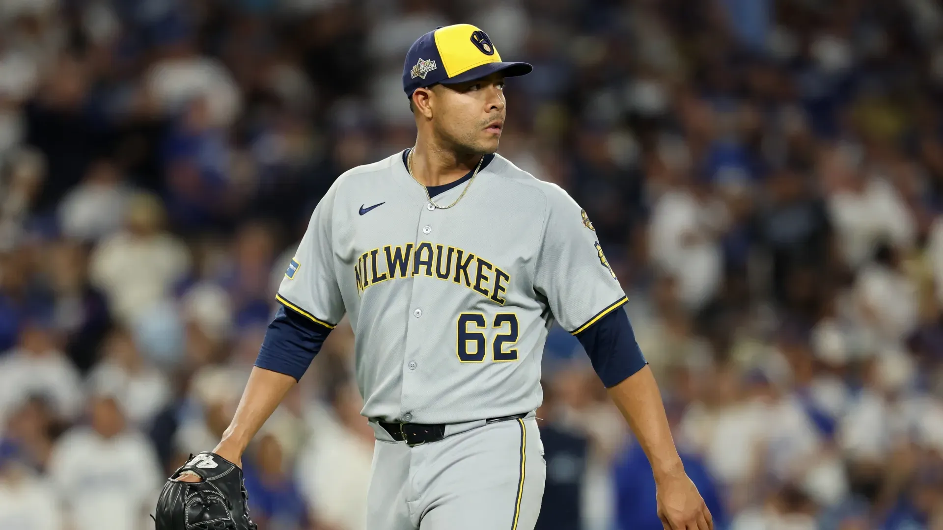 Jose Quintana looks on