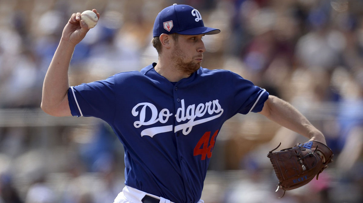Los Angeles Dodgers starting pitcher Brock Stewart (48) pitches against the Chicago Cubs during the first inning at Camelback Ranch.