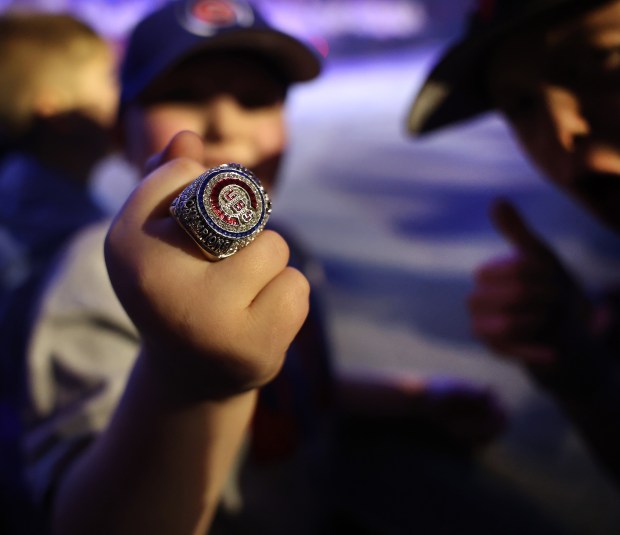 A young fan wears a replica 2016 World Series champion ring while attending day 1 of the Cubs Convention at the Sheraton Grand Chicago on Friday, Jan. 16, 2026. (Chris Sweda/Chicago Tribune)