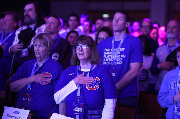 Chicago Cubs fans sing the national anthem on day 1 of the Cubs Convention at the Sheraton Grand Chicago on Friday, Jan. 16, 2026. (Chris Sweda/Chicago Tribune)