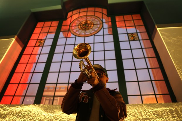 Trumpet player Romel Sims (cq) entertains fans as they enter the Ramova Theatre in Chicago's Bridgeport neighborhood for SoxFest on Friday, Jan. 30, 2026. (Chris Sweda/Chicago Tribune)