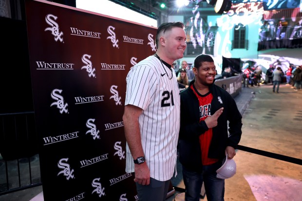 Chicago White Sox pitcher Tanner McDougal poses for a photograph with a fan during SoxFest at the Ramova Theatre in Chicago's Bridgeport neighborhood on Friday, Jan. 30, 2026. (Chris Sweda/Chicago Tribune)