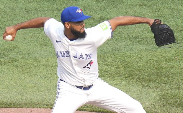 Blue Jays reliever Seranthony Domínguez delivers against the  Royals on Aug. 3, 2025, in Toronto. (Chris Young/The Canadian Press via AP)