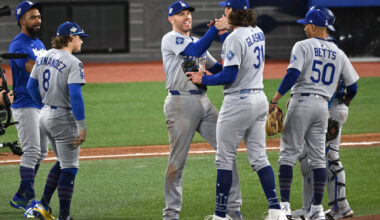 The Los Angeles Dodgers celebrate on the mound after winning Game 6 of the 2025 World Series.