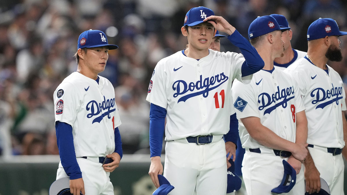 Dodgers celebrate in style as Shohei Ohtani soaks Yoshinobu Yamamoto, Roki Sasaki in champagne after they help sweep the Reds in NLWCS.