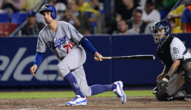 Former Los Angeles Dodgers outfielder Tim Locastro hitting a single against the San Diego Padres in 2018.