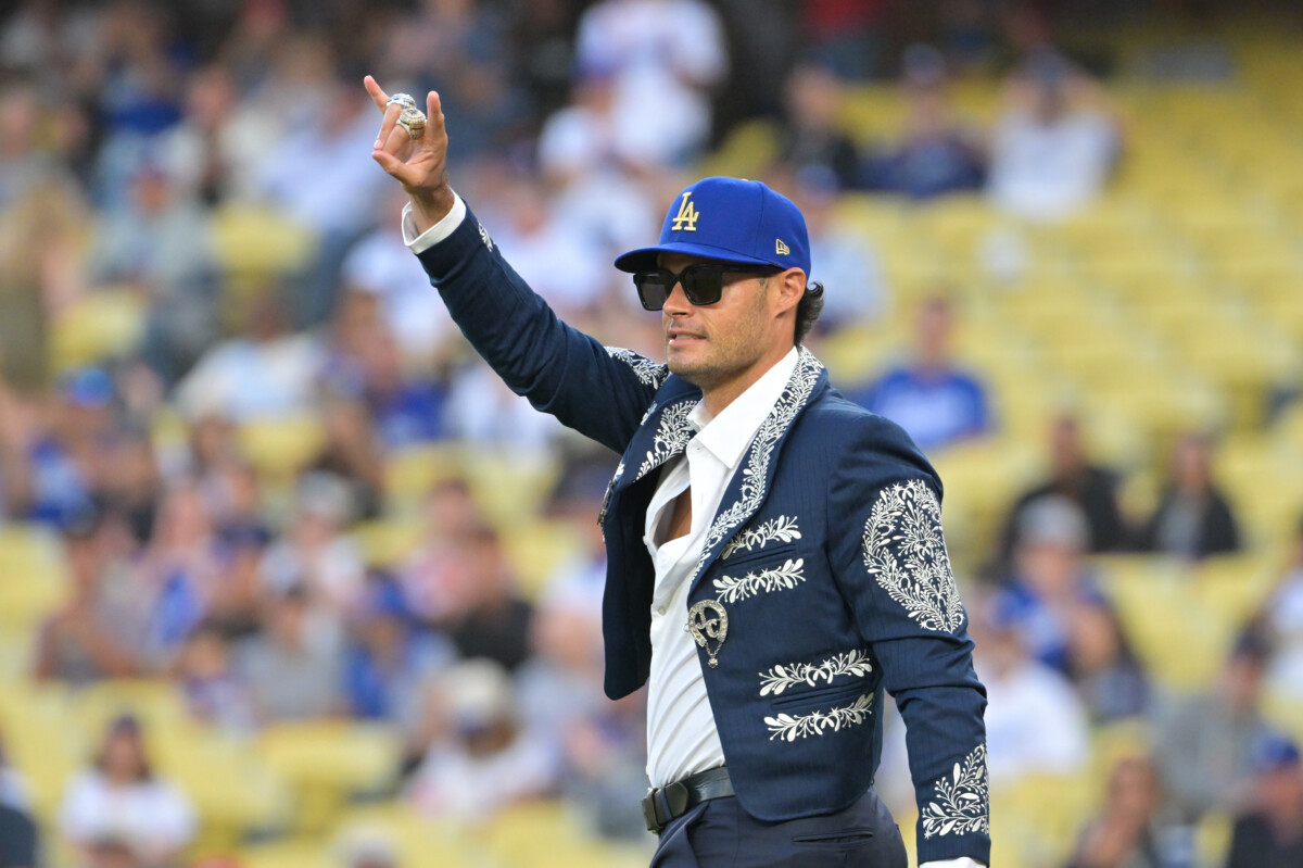 Former Los Angeles Dodgers relief pitcher Joe Kelly stepping out to throw the ceremonial first pitch at Dodger Stadium in 2025.