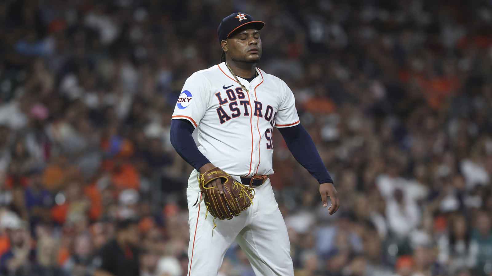 Houston Astros starting pitcher Framber Valdez (59) reacts after a play during the fourth inning against the Seattle Mariners at Daikin Park.