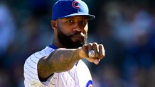 CHICAGO, ILLINOIS - OCTOBER 01: Jason Heyward #22 of the Chicago Cubs shows his world series ring after being honored in the fourth inning against the Cincinnati Reds at Wrigley Field on October 01, 2022 in Chicago, Illinois. (Photo by Quinn Harris/Getty Images)