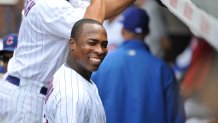 CHICAGO, IL - JUNE 29:  Alfonso Soriano #12 of the Chicago Cubs smiles as he stands in the dugout against the Houston Astros on June 29, 2012 at Wrigley Field in Chicago, Illinois. The Cubs defeated the Astros 4-0.  (Photo by Brian D. Kersey/Getty Images)