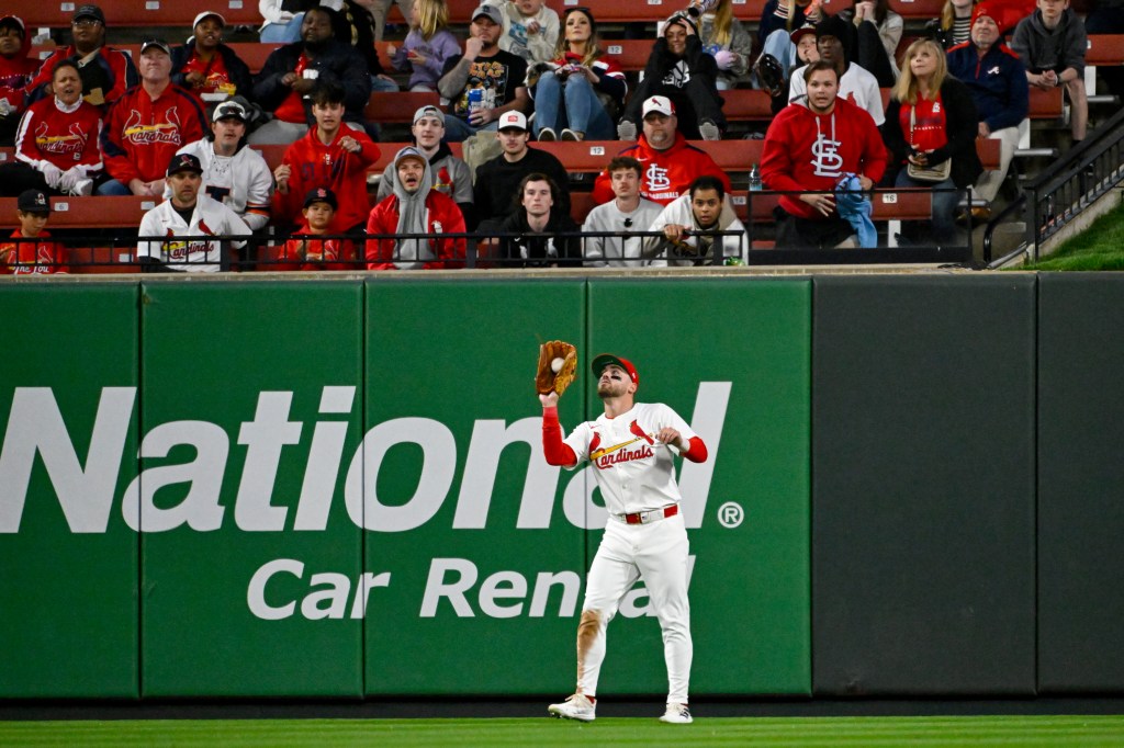 Michael Siani #22 of the St. Louis Cardinals catches the ball during the game between the Houston Astros