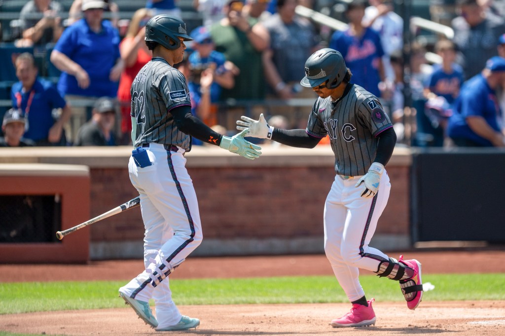 Francisco Lindor (12) with Juan Soto (22) after hitting a home run during the game between the San Francisco Giants and the New York Mets at Citi Field on Sunday, August 3, 2025 in Queens, New York. 