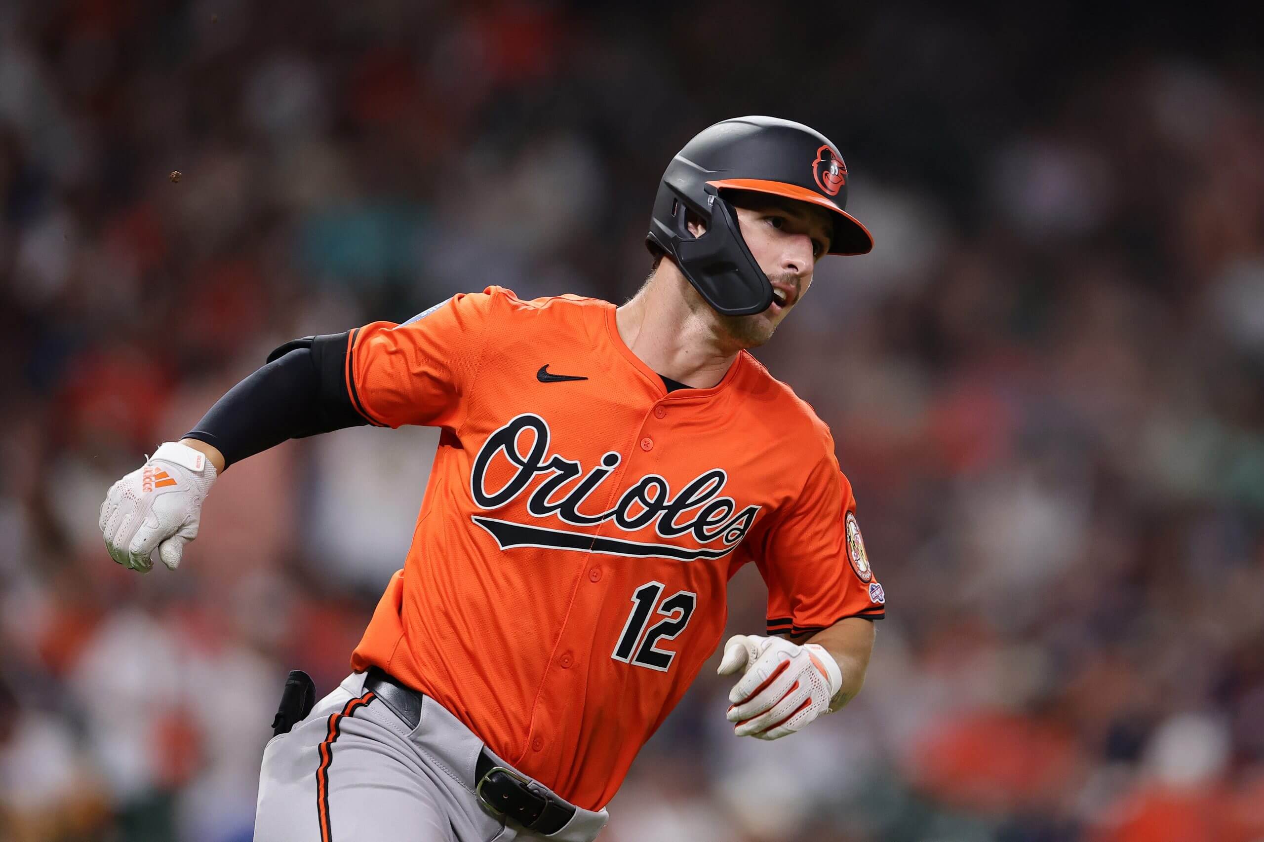 Dylan Beavers runs out of the batter's box for the Orioles.