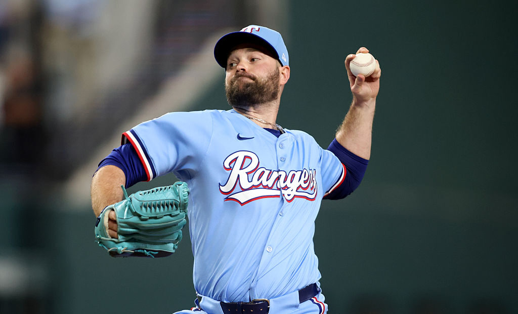 ARLINGTON, TEXAS - AUGUST 24: Danny Coulombe #54 of the Texas Rangers throws a pitch during the eighth inning against the Cleveland Guardians at Globe Life Field on August 24, 2025 in Arlington, Texas. (Photo by Tim Heitman/Getty Images)