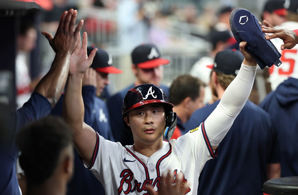Ha-Seong Kim reacts after scoring on a RBI double by Michael Harris II #23 in the second inning against the Washington Nationals at Truist Park on September 22, 2025 in Atlanta, Georgia.