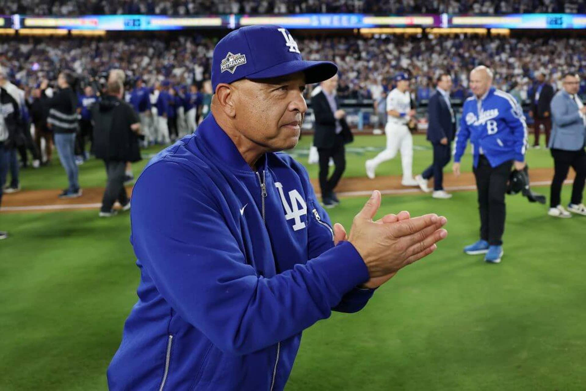 Los Angeles Dodgers manager Dave Roberts rubs his hands together after winning the NLCS.