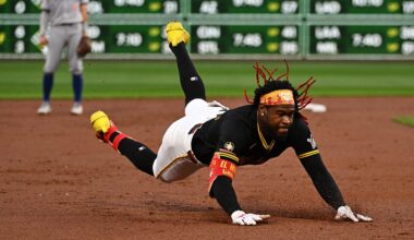Oneil Cruz sliding into third base