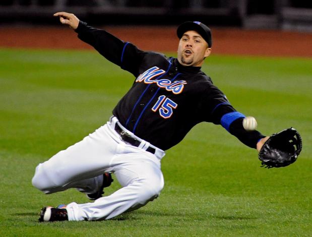 New York Mets outfielder Carlos Beltrán lunges for the ball during the third inning against the Arizona Diamondbacks, April 22, 2011 in New York. (AP Photo/Bill Kostroun, File)