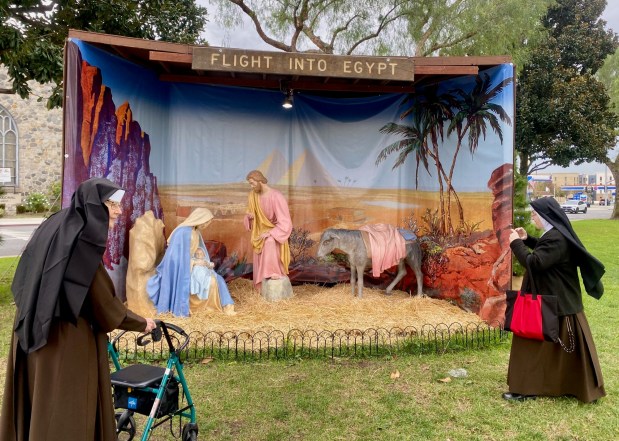 Nuns from a retirement community in Duarte visit the Euclid Avenue Nativity scenes in Ontario on Dec. 30. (Courtesy Mark Kendall)