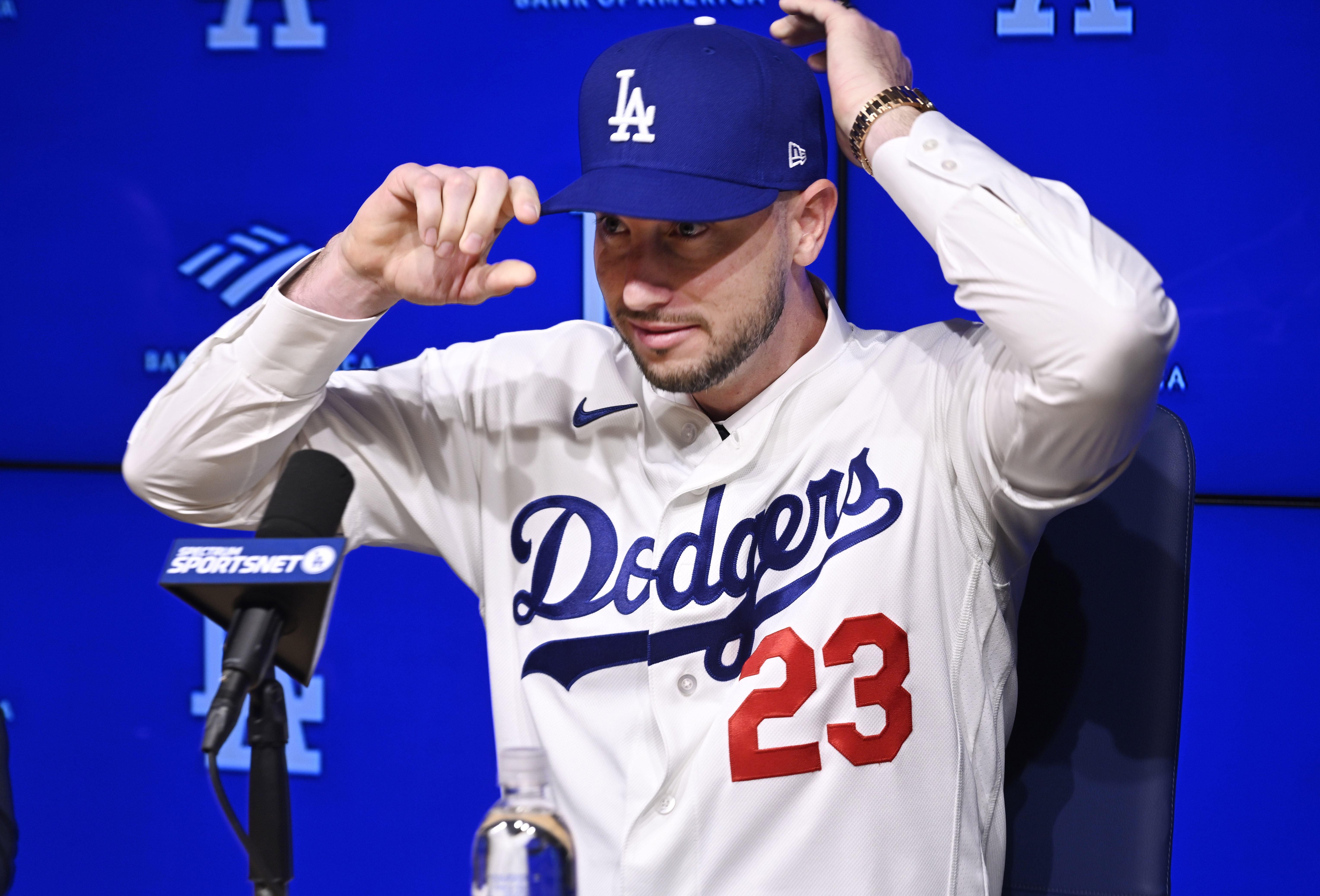 Newly signed Dodgers outfielder Kyle Tucker adjusts his cap during...