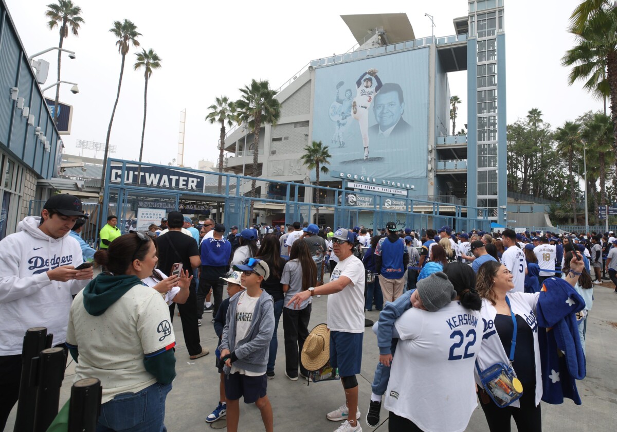 Los Angeles Dodgers fans entering the stadium for the World Series celebration in 2025.