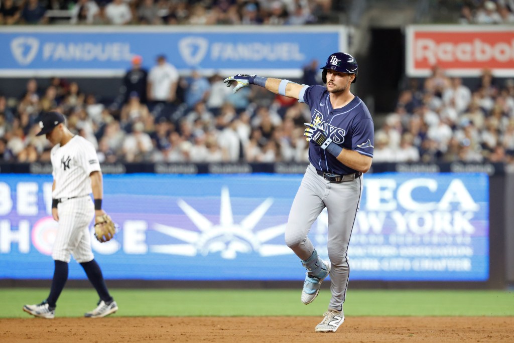 Josh Lowe reacts as he rounds the bases on his two-run homer 