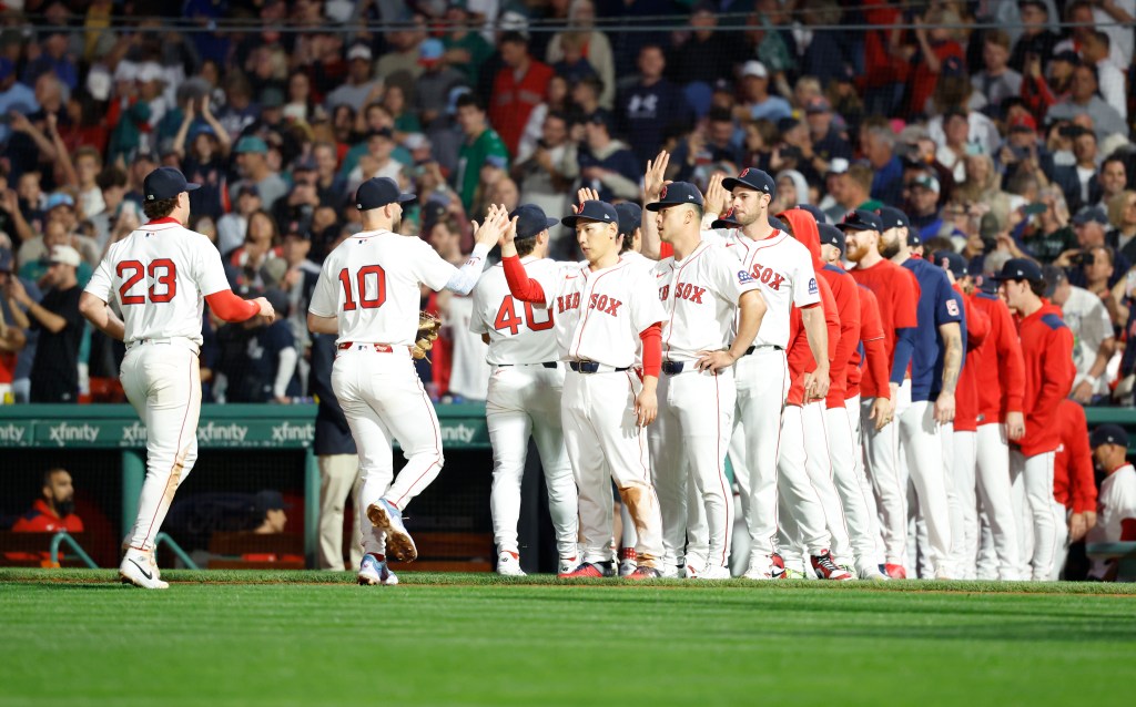 The Red Sox celebrate a win over the Yankees at Fenway Park in 2025.