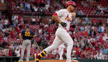 St. Louis Cardinals' Nolan Arenado, right, rounds the bases after hitting a solo home run off Milwaukee Brewers starting pitcher Wade Miley (20) during the second inning of a baseball game Tuesday, May 16, 2023, in St. Louis. (AP Photo/Jeff Roberson)