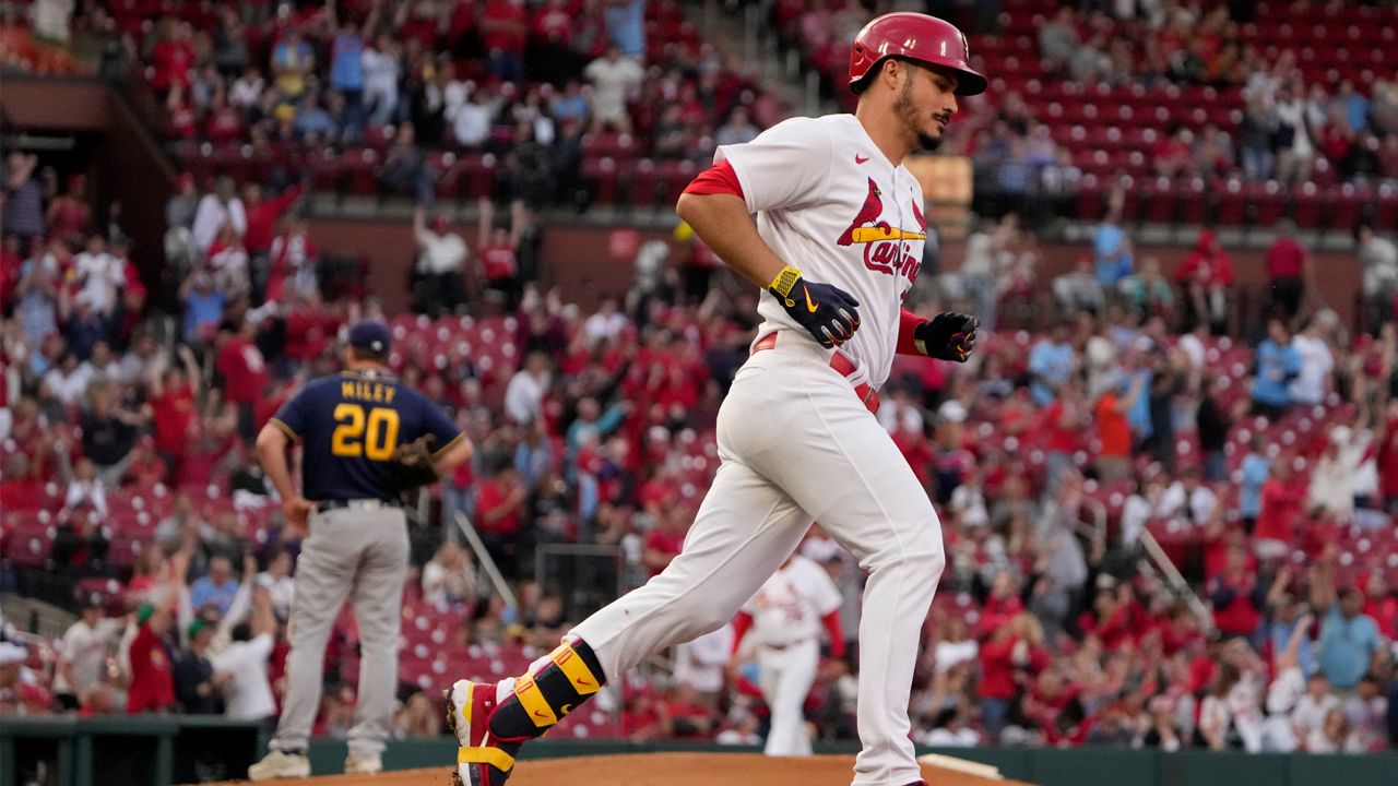 St. Louis Cardinals' Nolan Arenado, right, rounds the bases after hitting a solo home run off Milwaukee Brewers starting pitcher Wade Miley (20) during the second inning of a baseball game Tuesday, May 16, 2023, in St. Louis. (AP Photo/Jeff Roberson)