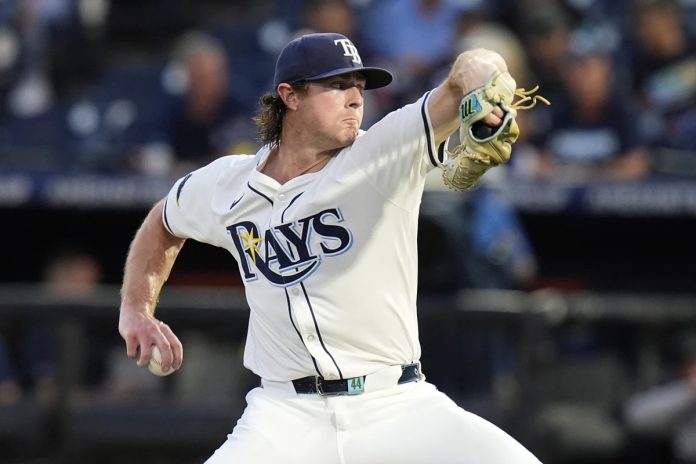 Tampa Bay Rays pitcher Ryan Pepiot delivers to the Cleveland Guardians during the first inning of a baseball game Thursday, Sept. 4, 2025, in Tampa, Fla. (AP Photo/Chris O'Meara)