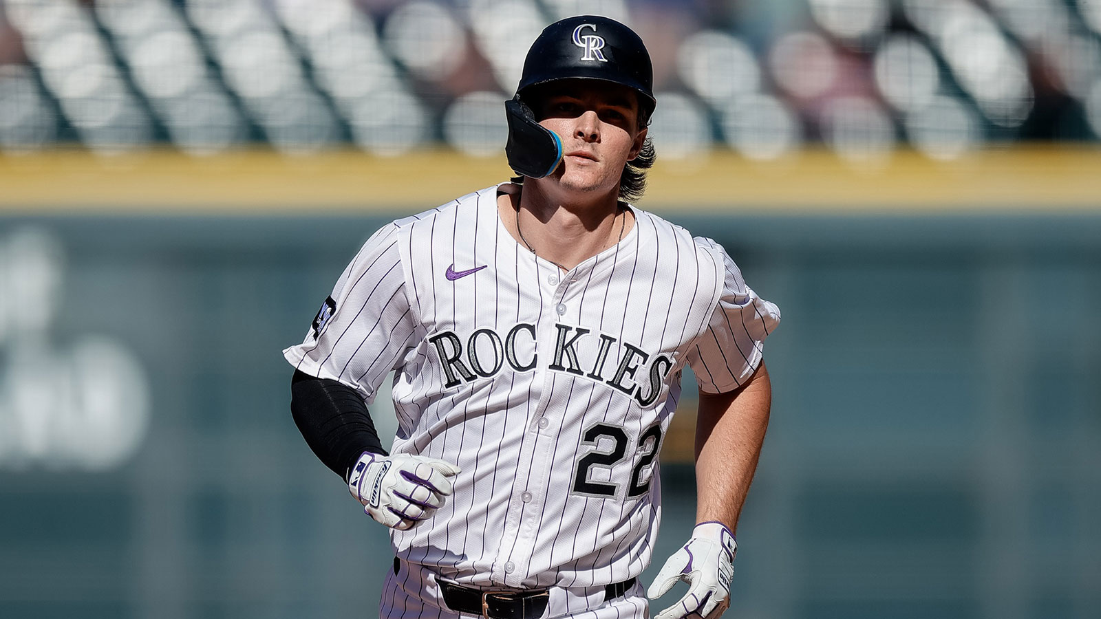 Colorado Rockies center fielder Mickey Moniak (22) rounds the bases on a two run home run in the ninth inning against the Miami Marlins at Coors Field. Mandatory Credit: Isaiah J. Downing-Imagn Images