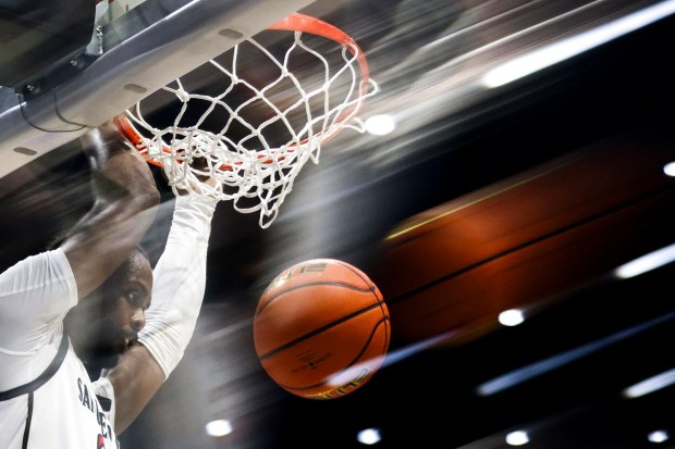 (EDITORS NOTE: A special effects camera filter was used for this image.) San Diego State forward Jared Coleman-Jones dunks against Air Force during their game at Viejas Arena on Wednesday, Jan. 8, 2025 in San Diego, CA.