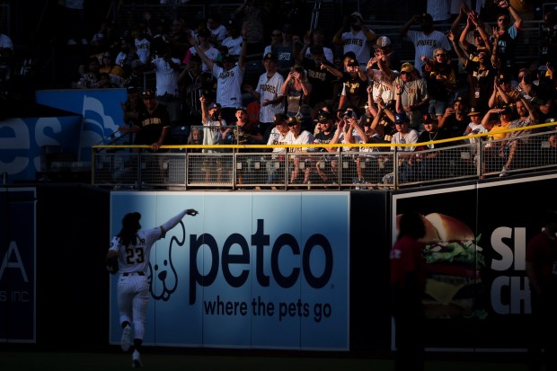 Fans cheer as San Diego Padres right fielder Fernando Tatis Jr. #23 acknowledges the crowd before their game against the San Francisco Giants at Petco Park on Wednesday, Aug. 20, 2025 in San Diego, CA. (Meg McLaughlin / The San Diego Union-Tribune)