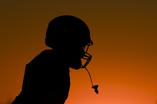 Lincoln's De'Andre Williams #17 takes the field to warmup before their game against Long Beach Poly at Lincoln High School on Friday, Aug. 29, 2025 in San Diego, CA. (Meg McLaughlin / The San Diego Union-Tribune)