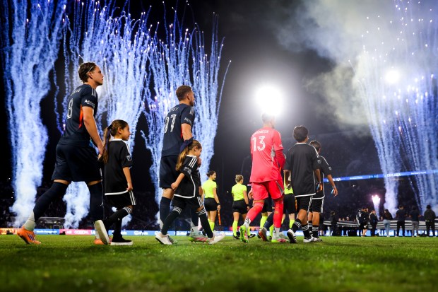 San Diego FC players walk onto the pitch before the 2025 MLS Cup Playoffs: Conference Semifinals against Minnesota United at Snapdragon Stadium on Monday, Nov. 24, 2025 in San Diego, California. (Meg McLaughlin / The San Diego Union-Tribune)