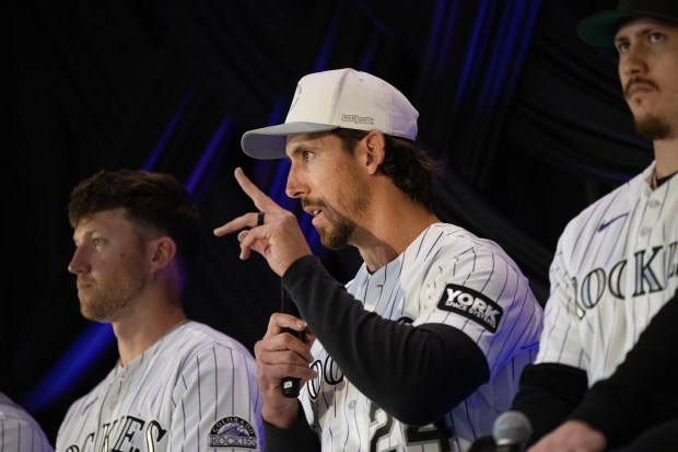 Colorado Rockies pitcher Michael Lorenzen (24), center, speaks during a pitchers Q&A session during Rockies Fest on Saturday at Coors Field in Denver. (Photo by Timothy Hurst/The Denver Post)