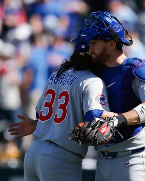 Chicago Cubs pitcher Eli Morgan (33) shakes hands with catcher Carson Kelly (15) after the game against the Athletics at Sutter Health Park.