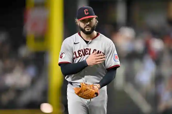 Aug 24, 2025; Arlington, Texas, USA; Cleveland Guardians relief pitcher Jakob Junis (16) comes off the field after he pitches against the Texas Rangers during the sixth inning at Globe Life Field. Mandatory Credit: Jerome Miron-Imagn Images