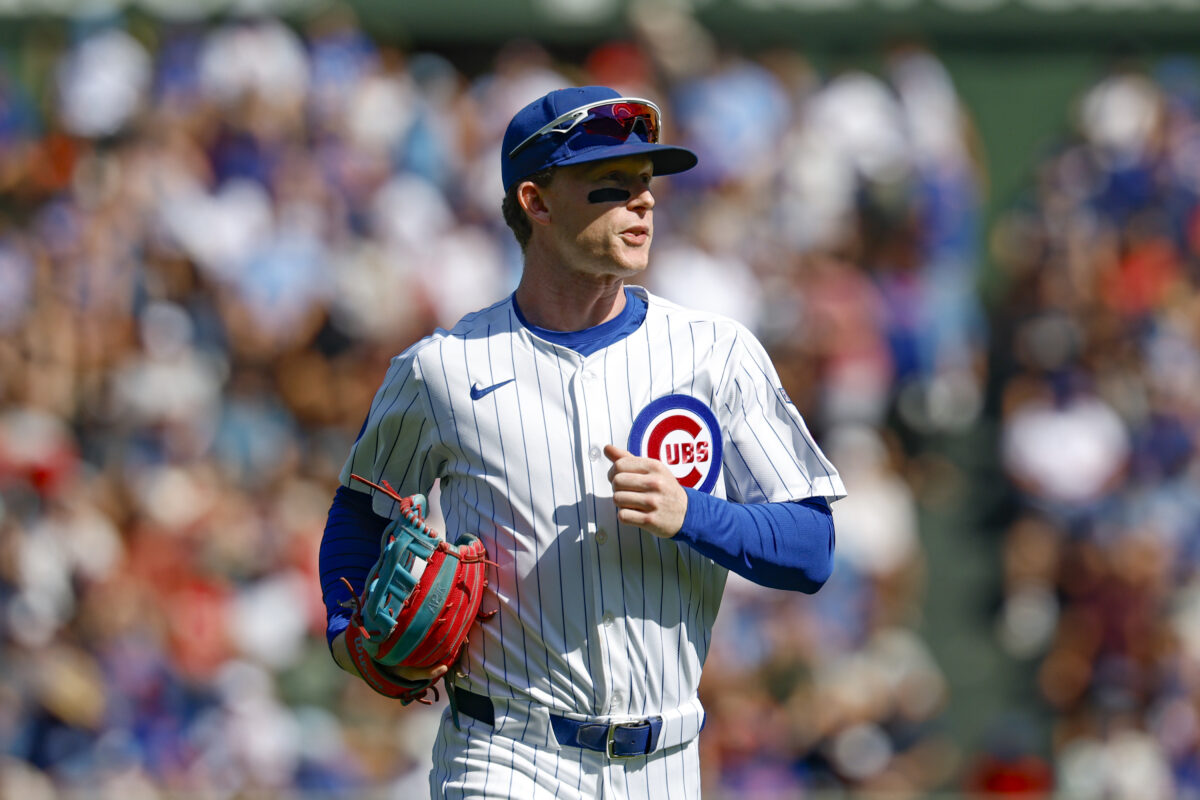 Sep 27, 2025; Chicago, Illinois, USA; Chicago Cubs center fielder Pete Crow-Armstrong (4) runs back to the dugout during the first inning of a baseball game against the St. Louis Cardinals at Wrigley Field. Mandatory Credit: Kamil Krzaczynski-Imagn Images
