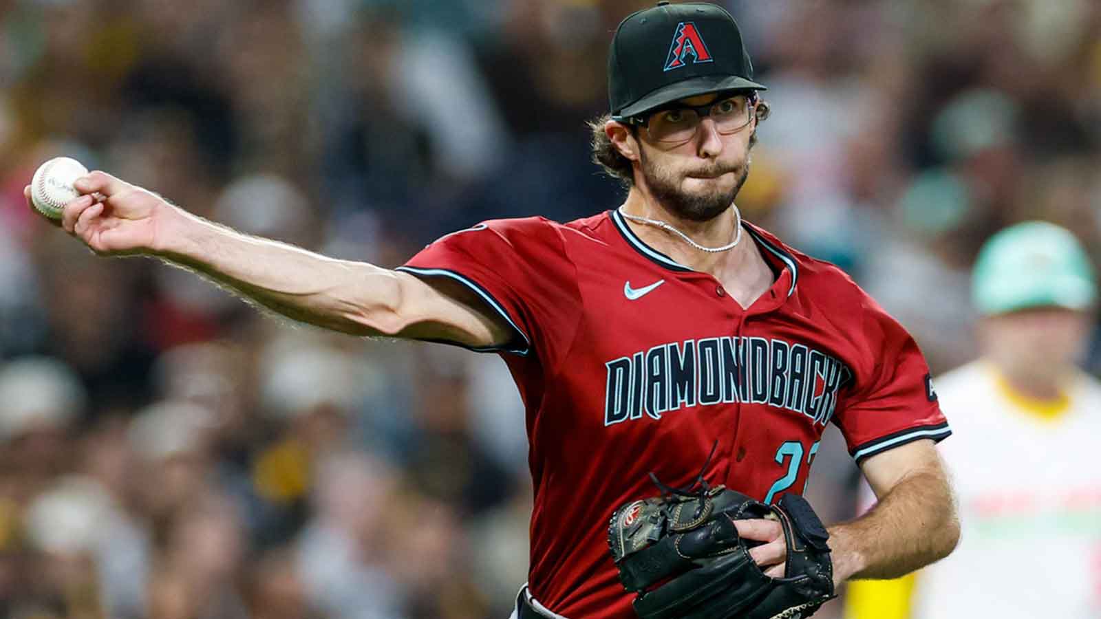 Arizona Diamondbacks starting pitcher Zac Gallen (23) throws to first base for an out during the second inning against the San Diego Padres at Petco Park.